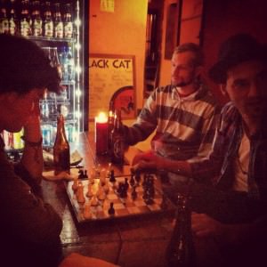 My friend Dillon plays chess at the Black Cat Hostel in Antigua, Guatemala.